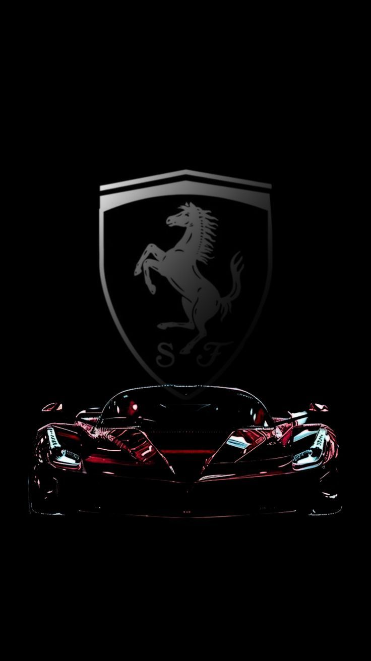 a black and red sports car in the dark