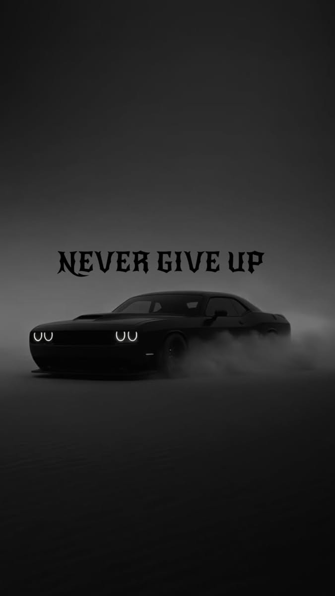 a black car with two eyes and the words never give up in front of it