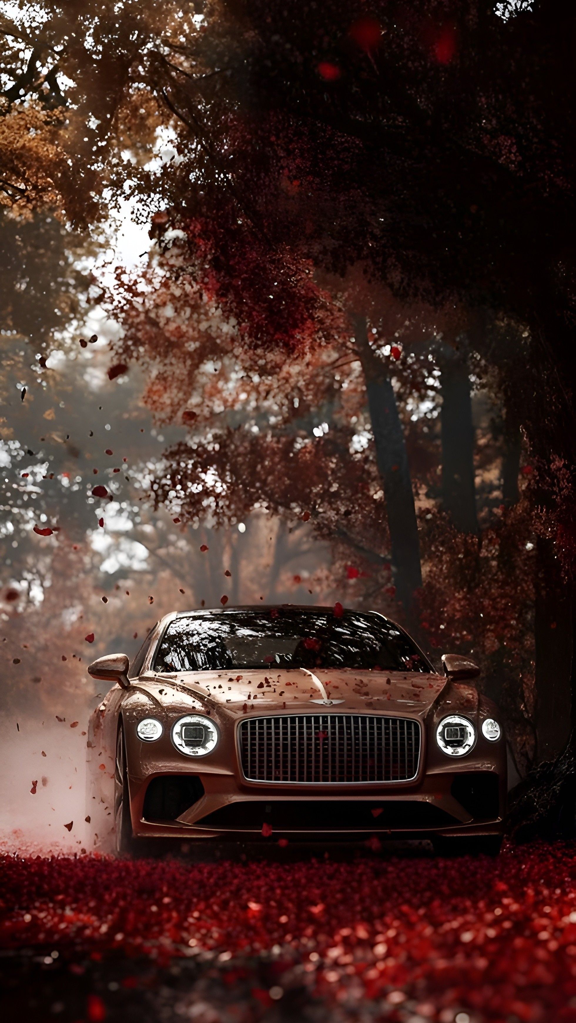 a car is driving through the woods with red leaves on the ground and trees in the background