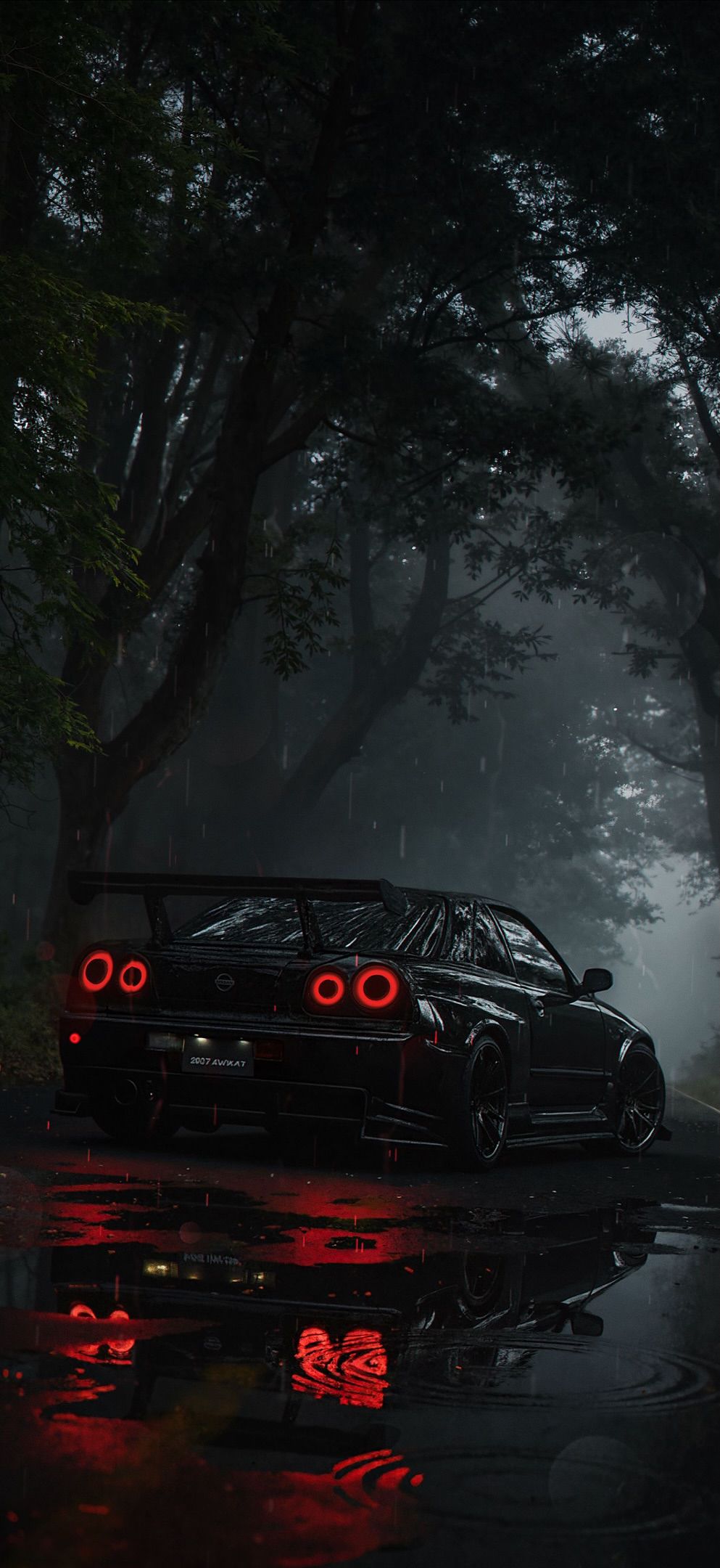 a car parked in the rain with its lights on