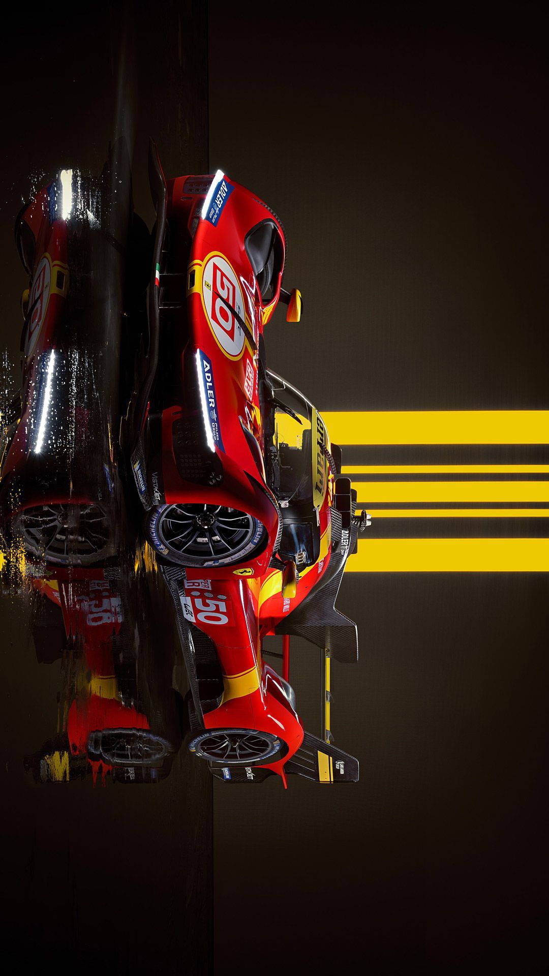 a red race car driving down a track with yellow and black stripes behind it on a dark background