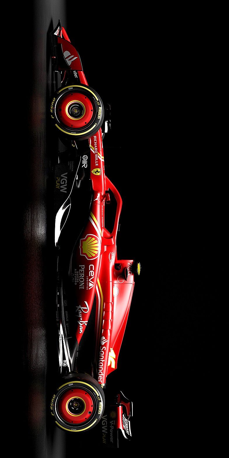 a red race car is parked in the dark