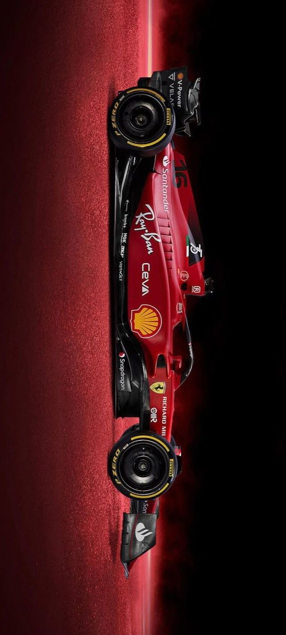 a red race car is shown from above