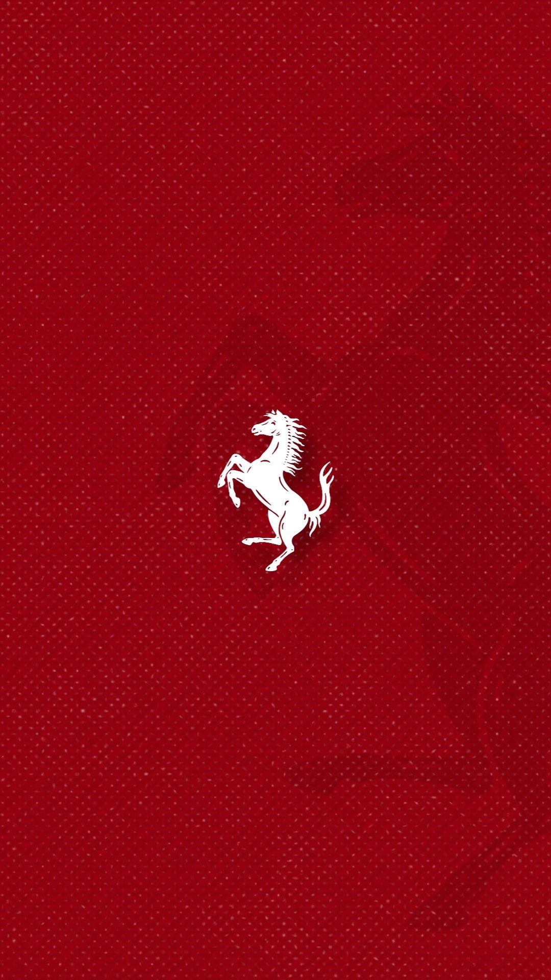 a red wallpaper with a white horse on it's back and the word ferrari written