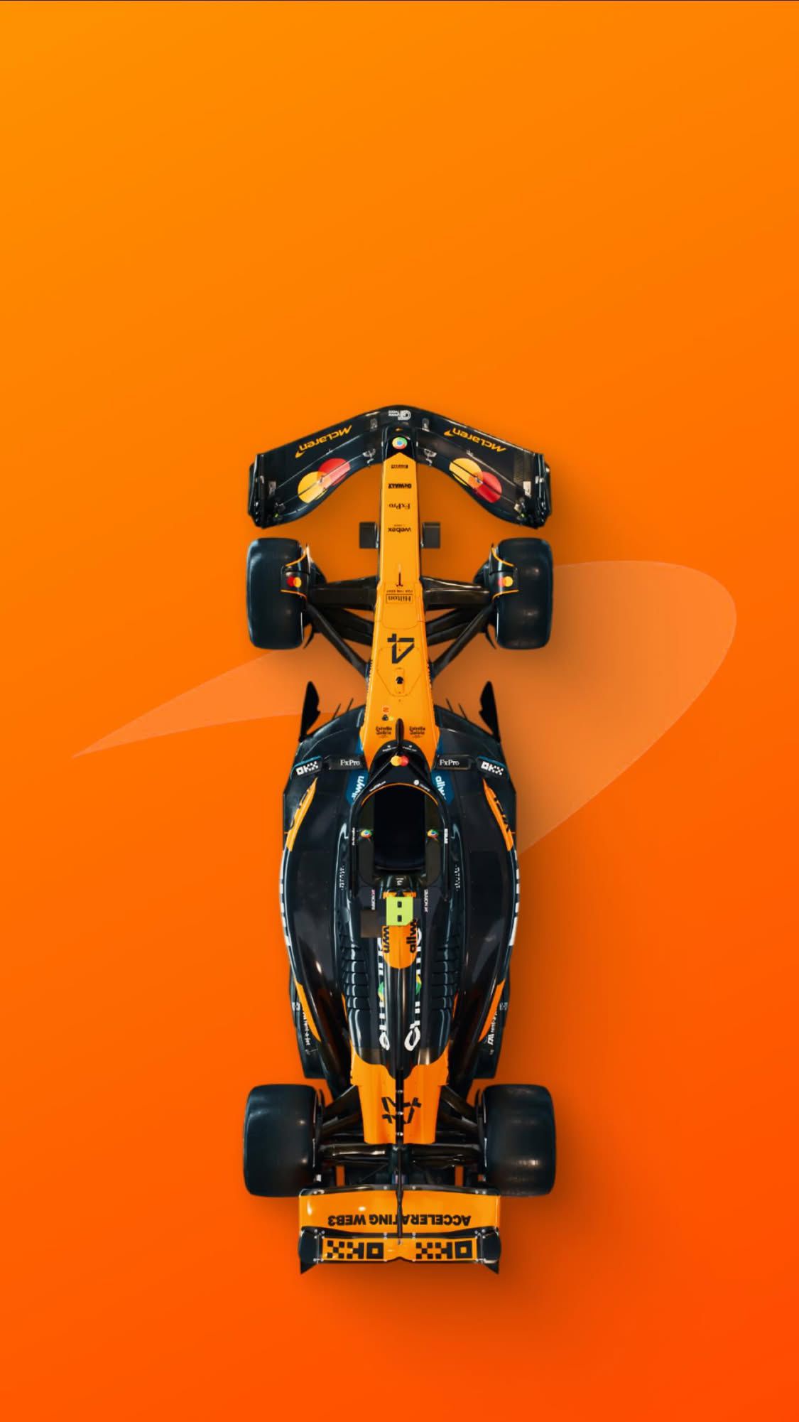 an orange and black race car is shown from the top down on an orange background