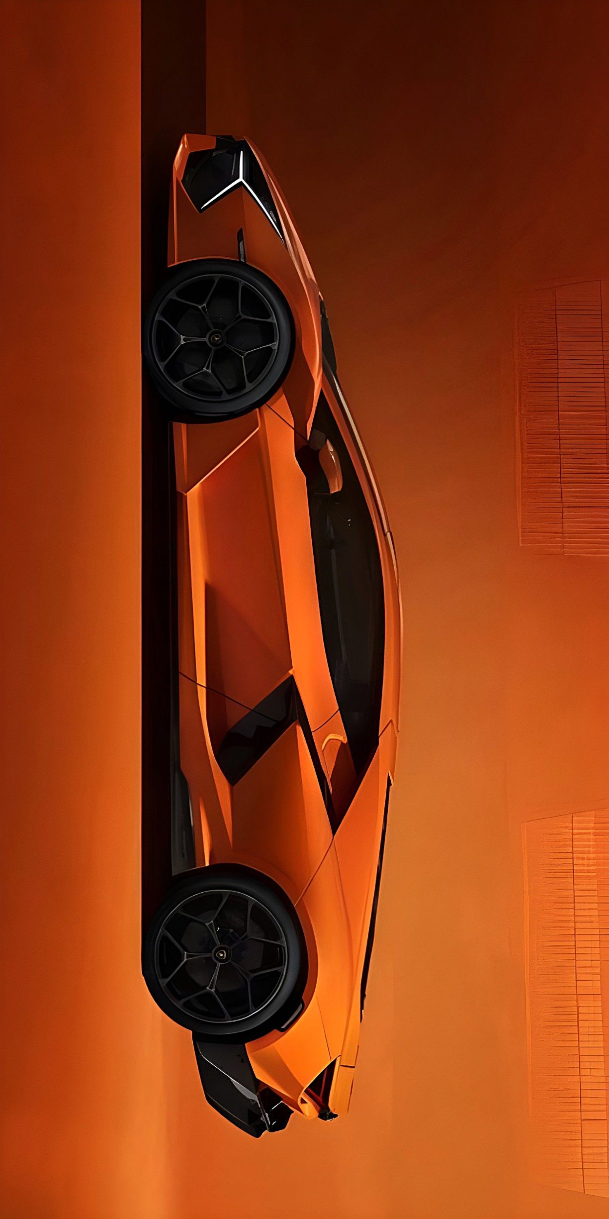 an orange sports car is shown from above