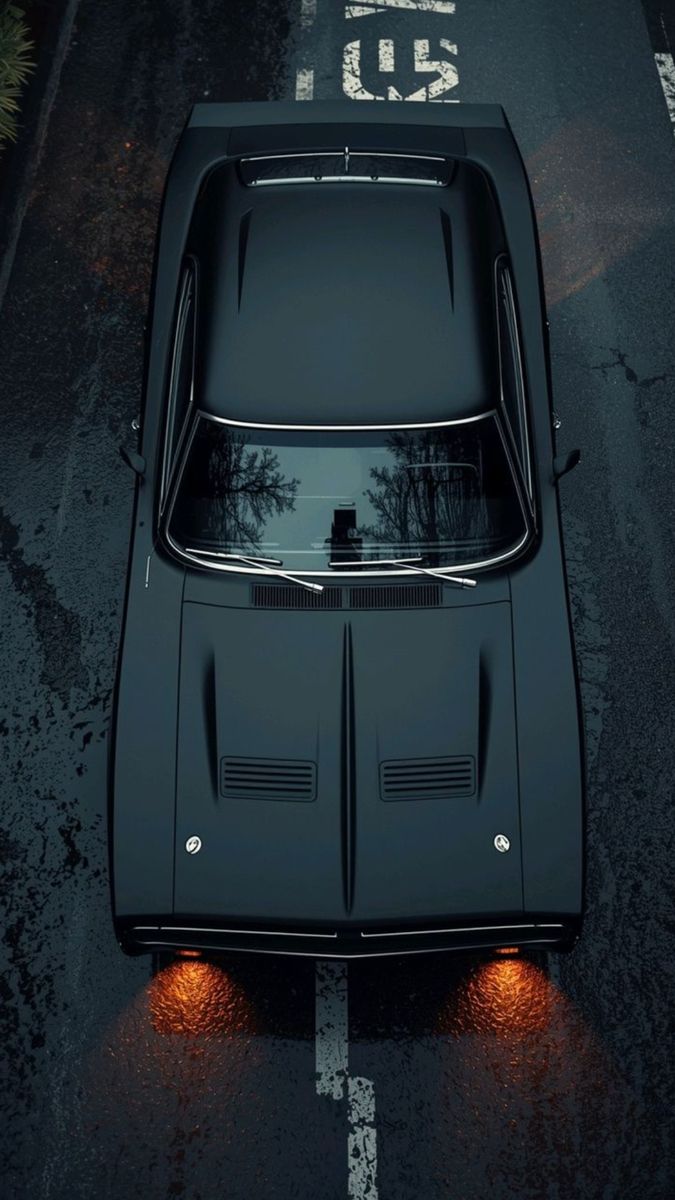 an overhead view of a black sports car