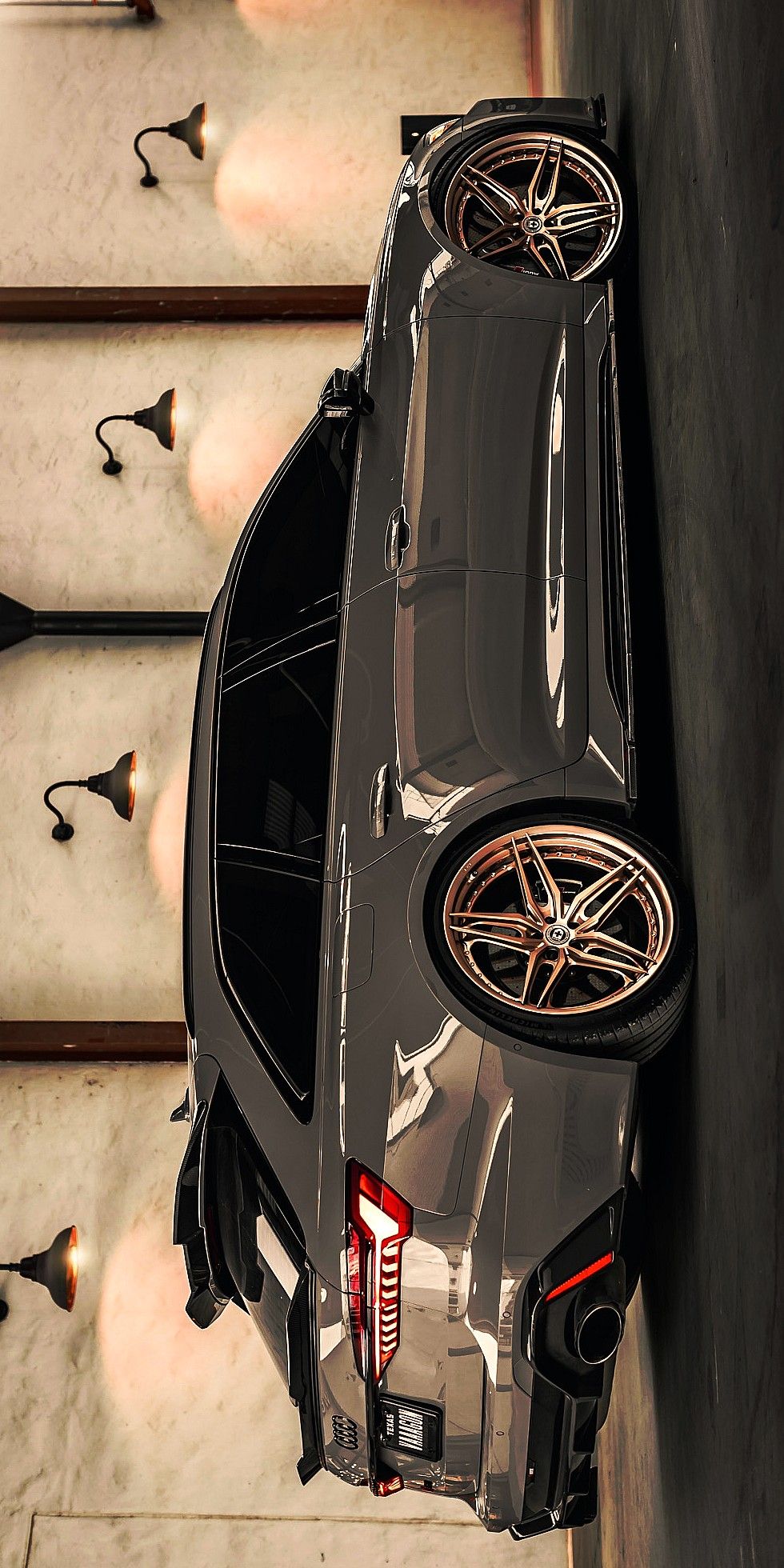 an overhead view of a car parked in a garage