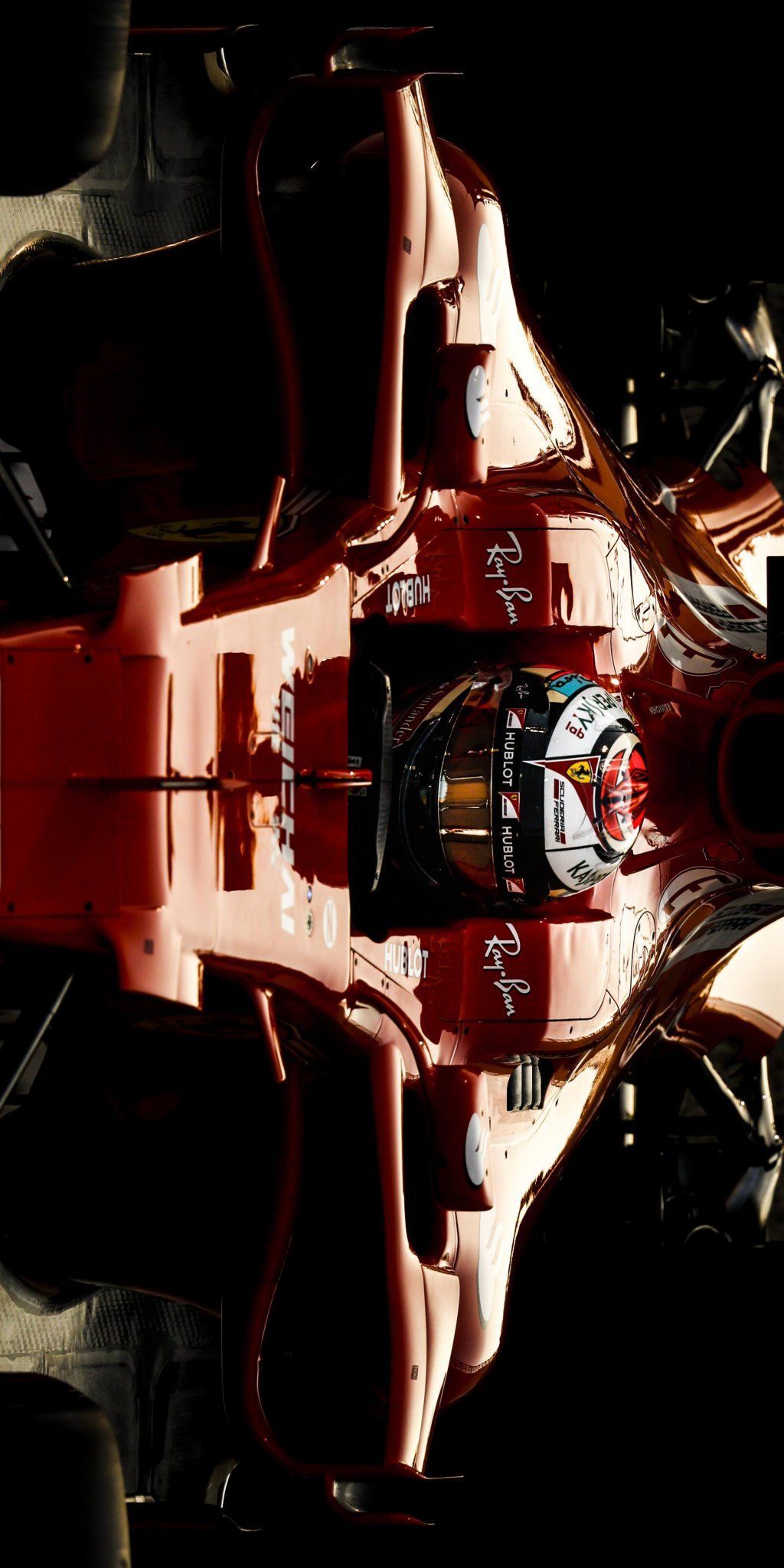 an overhead view of a red race car