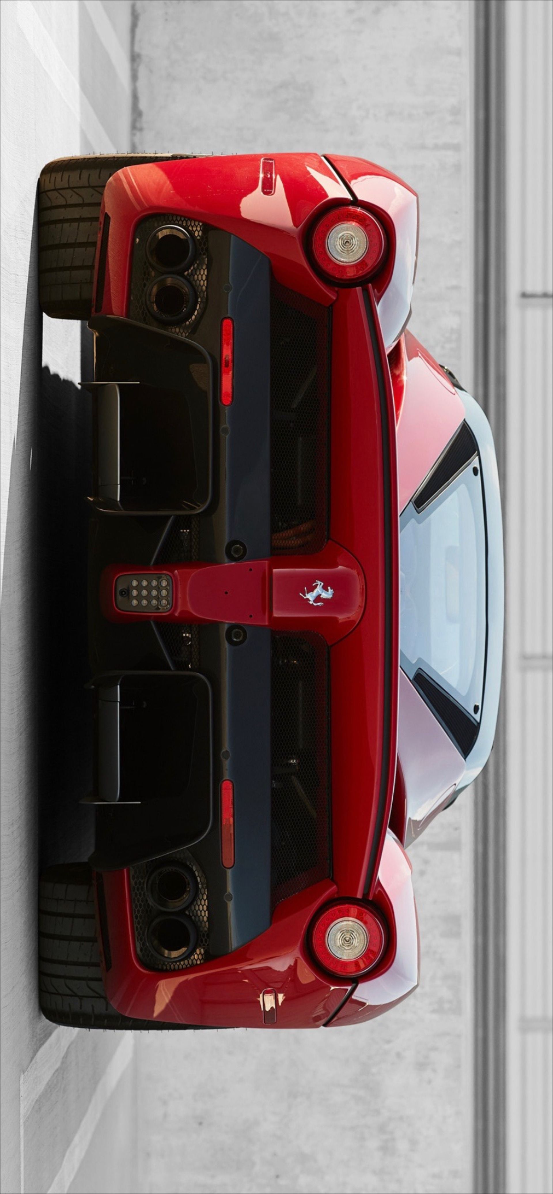 an overhead view of a red sports car