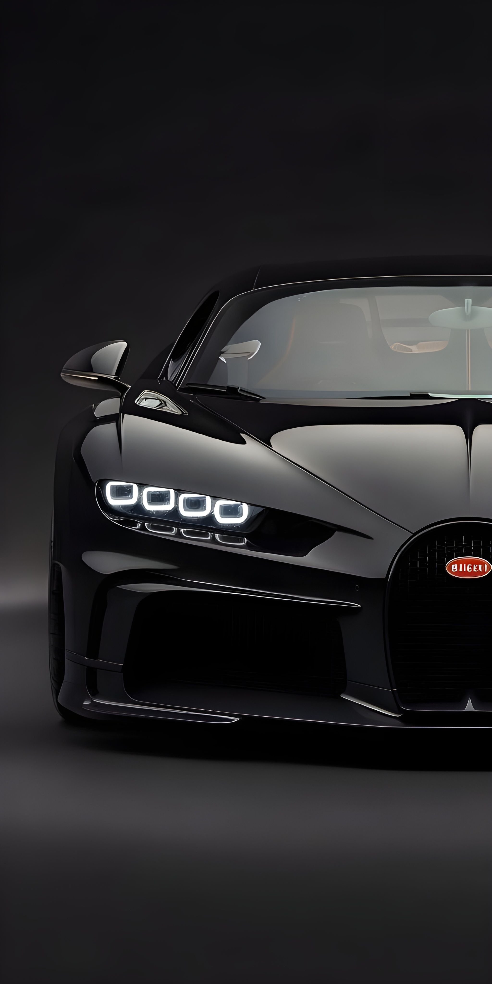 the front end of a black bugatti sports car in a dark studio area