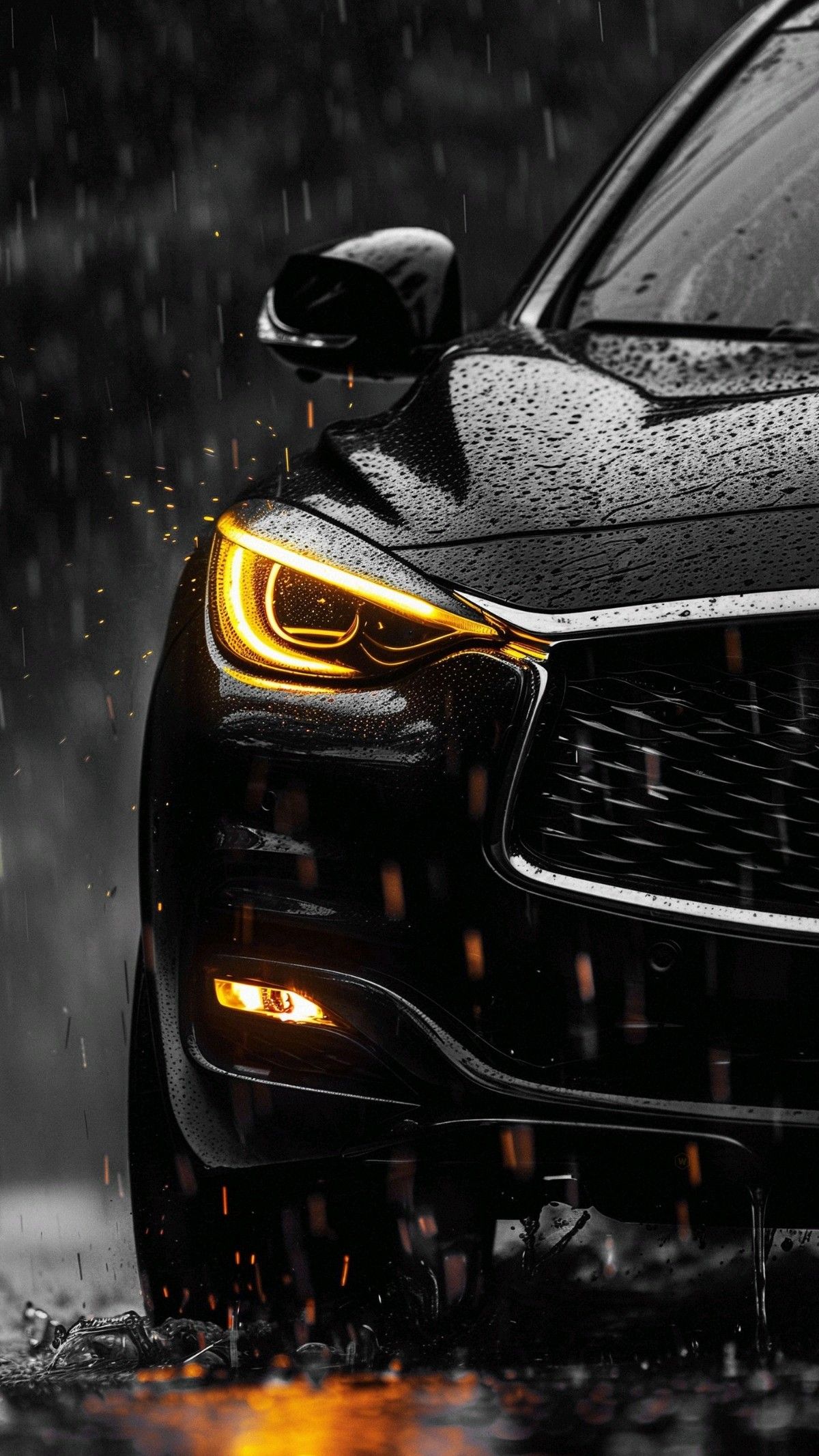 the front end of a black sports car in the rain with its headlights turned on