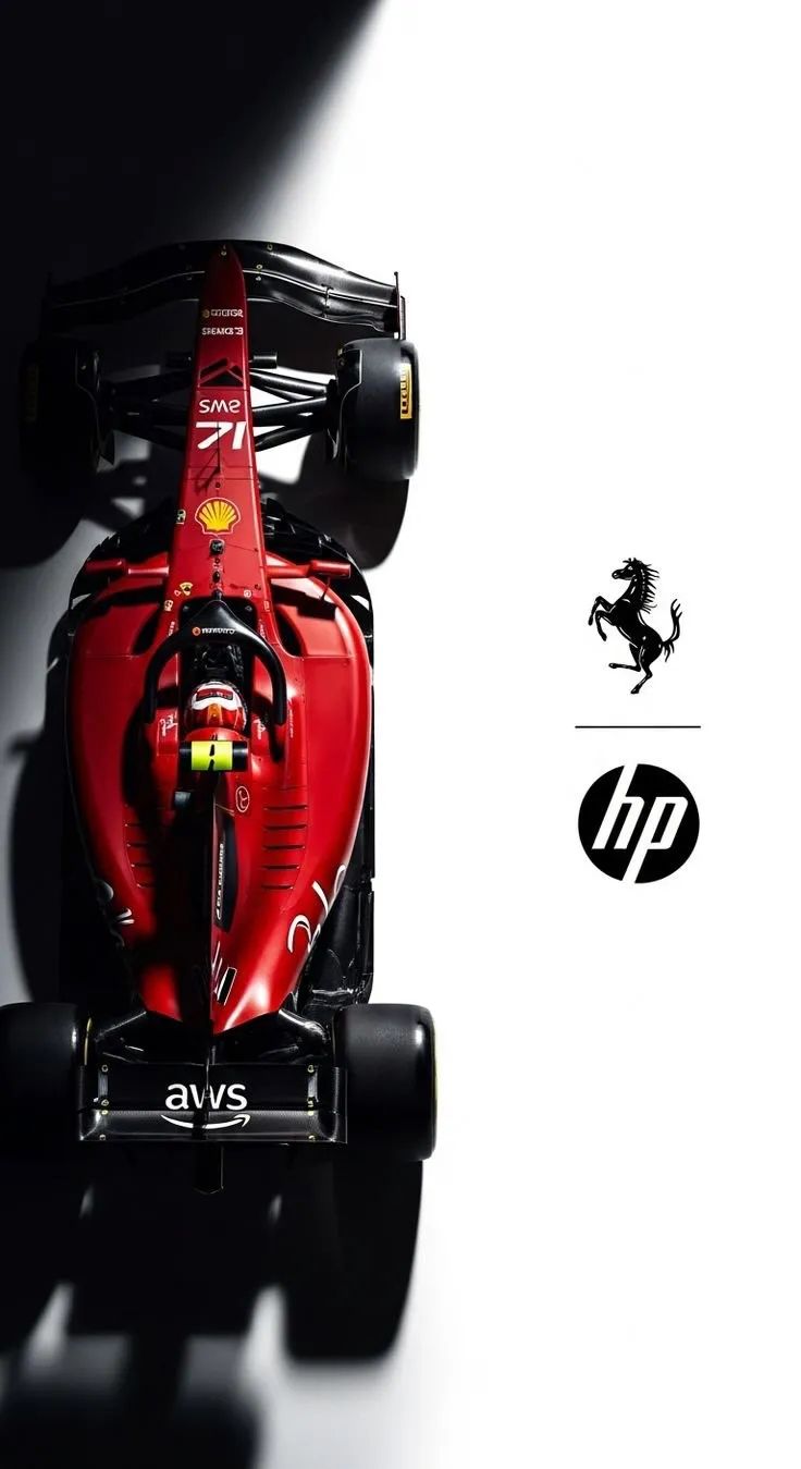 the front end of a red race car on a white and black background with an hp logo