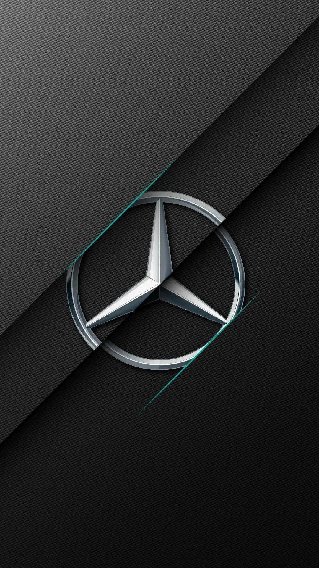 the mercedes logo on a black background